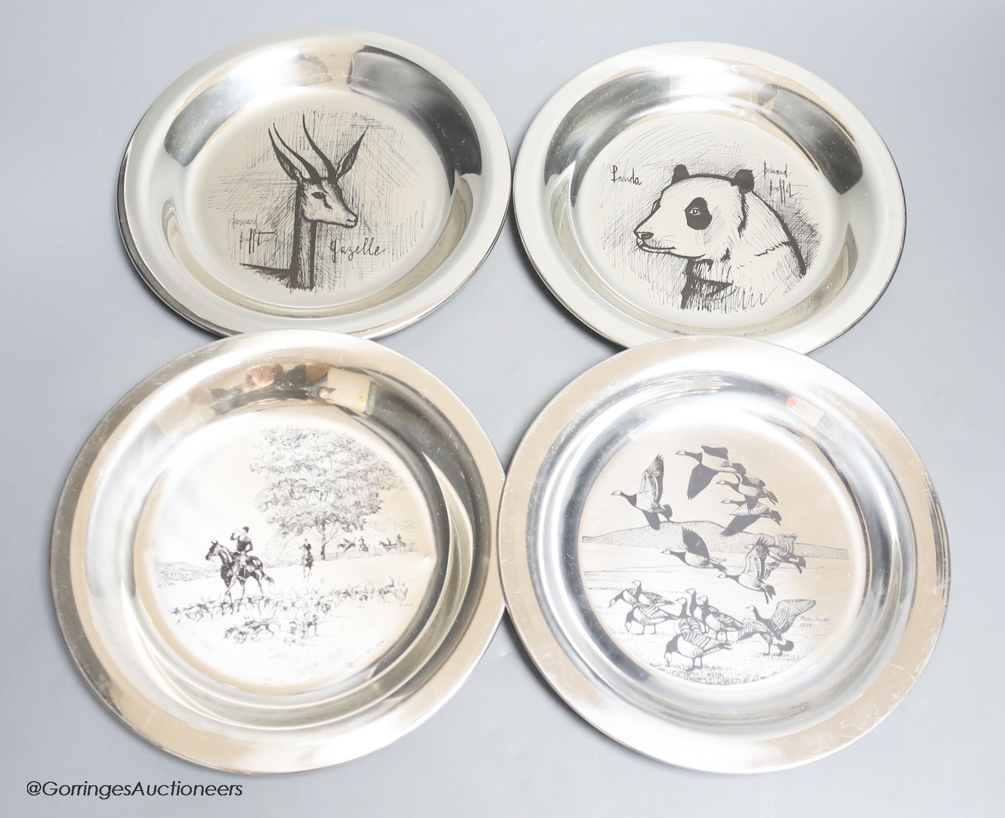 Four modern silver plates, two decorated after Bernard Buffet, dated verso 1973-4, detailing a Gazelle and Panda, each marked ‘Gravée à l’eau forte sue agent sterling 1er titre’ together with an example decorated by Pete